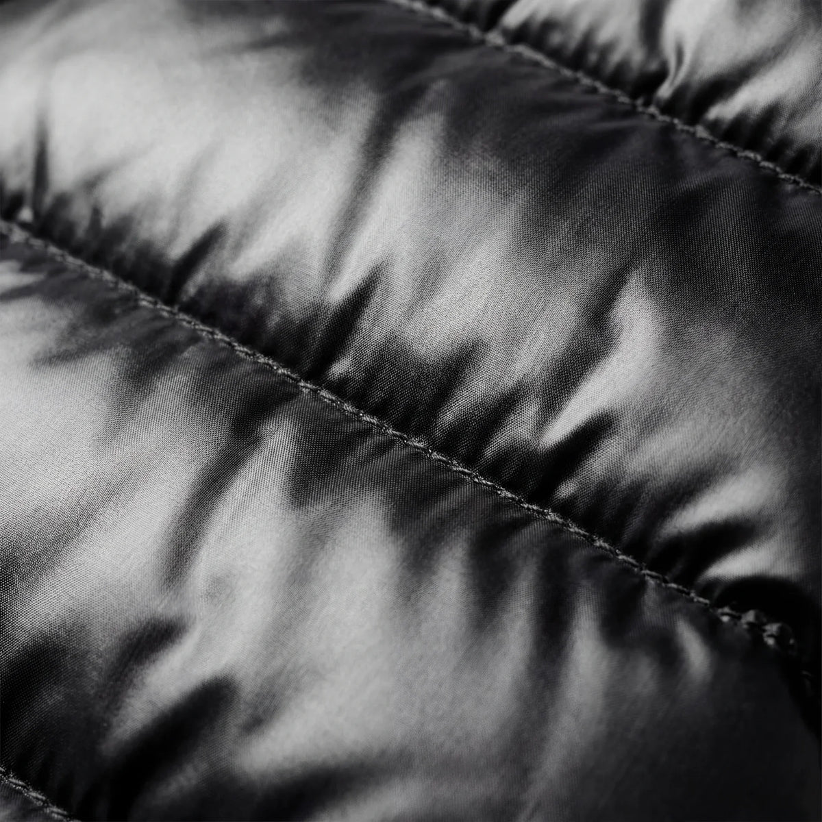 Close-up of a black and white quilted fabric texture