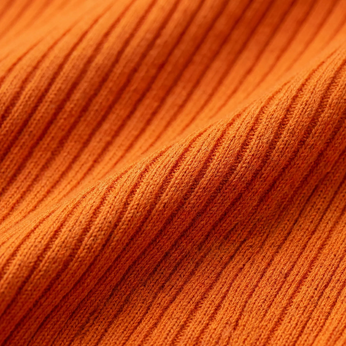 Close-up of orange fabric texture