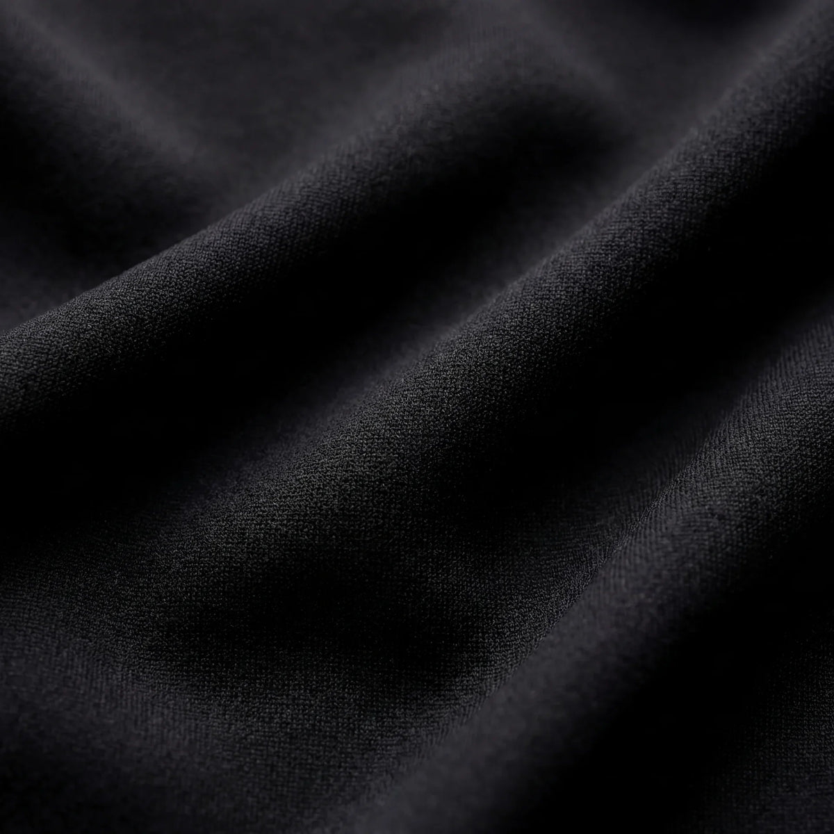 Close-up of black fabric with a textured surface