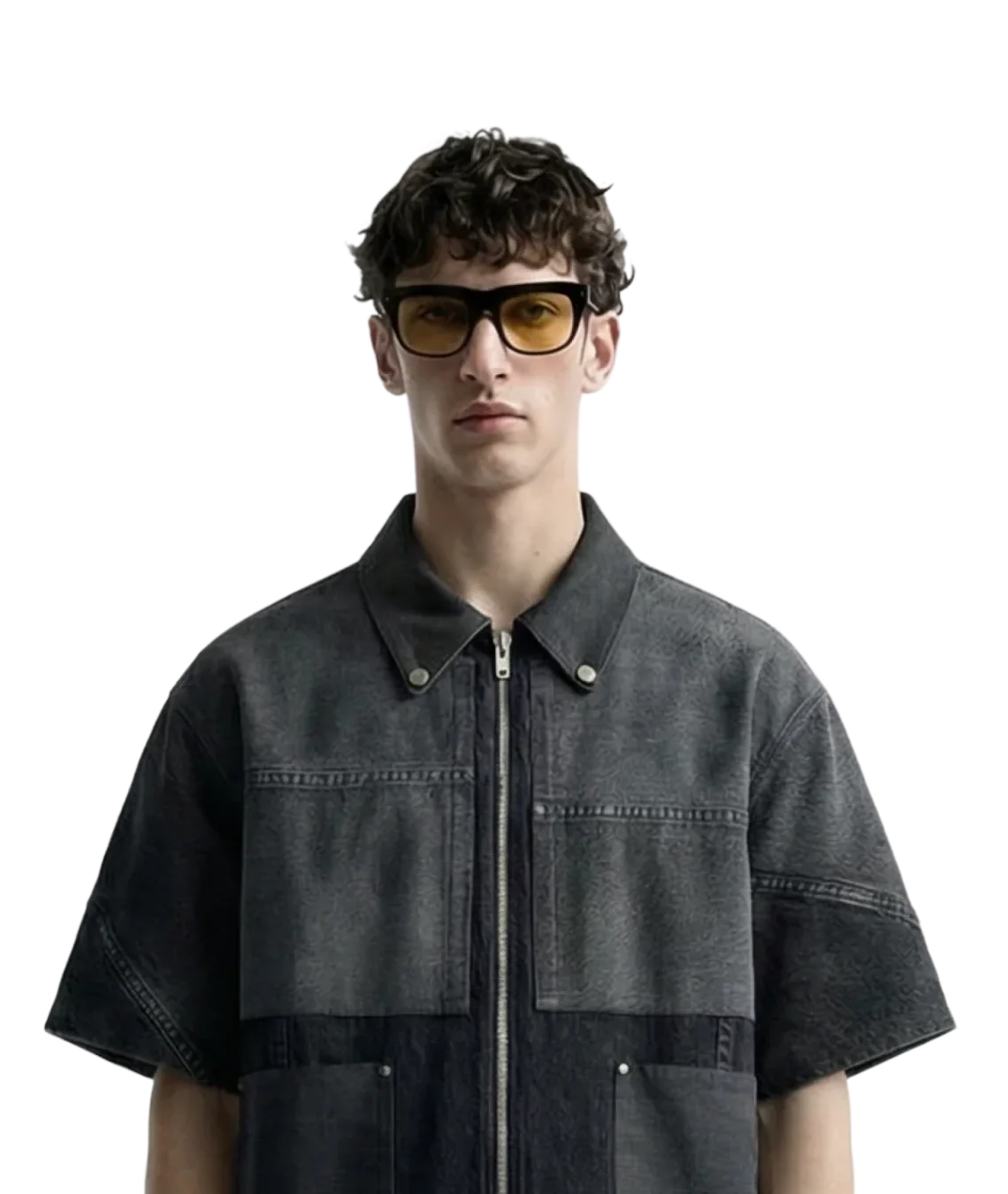 Man wearing a dark denim jacket and sunglasses on a white background