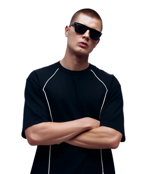 Man wearing a black t-shirt with white accents and sunglasses on a white background