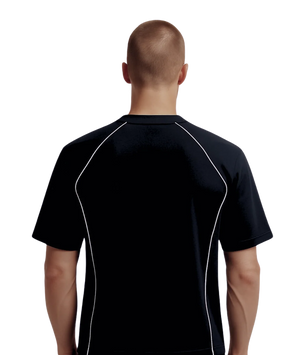 Man wearing a black athletic shirt with white accents on a white background
