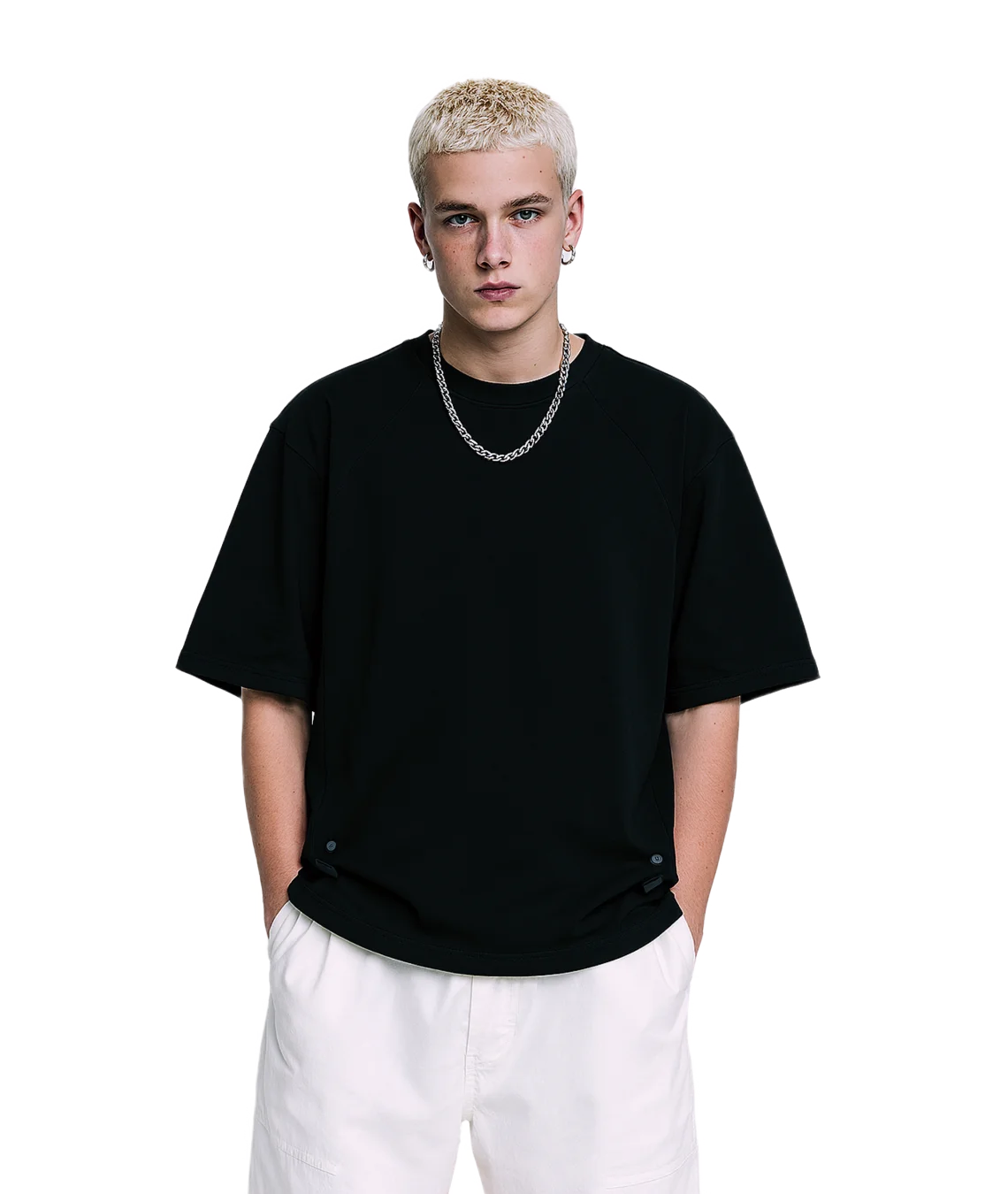 Person wearing a black t-shirt and white pants on a white background