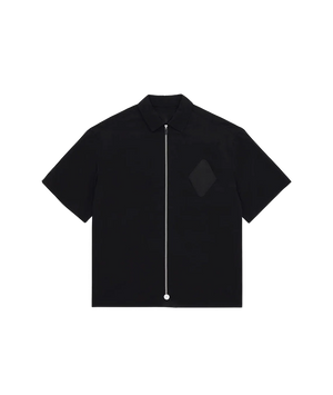 A black short-sleeve collared shirt with a front zipper and a tonal diamond-shaped chest patch, shown flat against a white background.