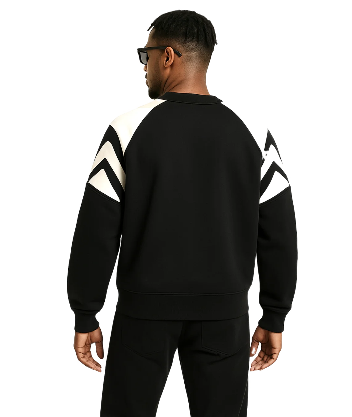 Person wearing a black and white outfit with geometric patterns on a transparent background