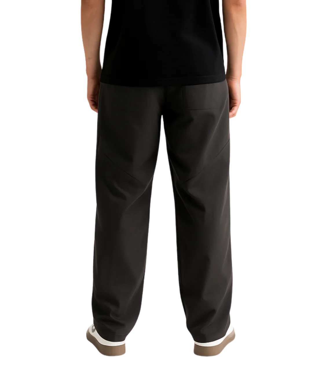 Person wearing black pants on a white background