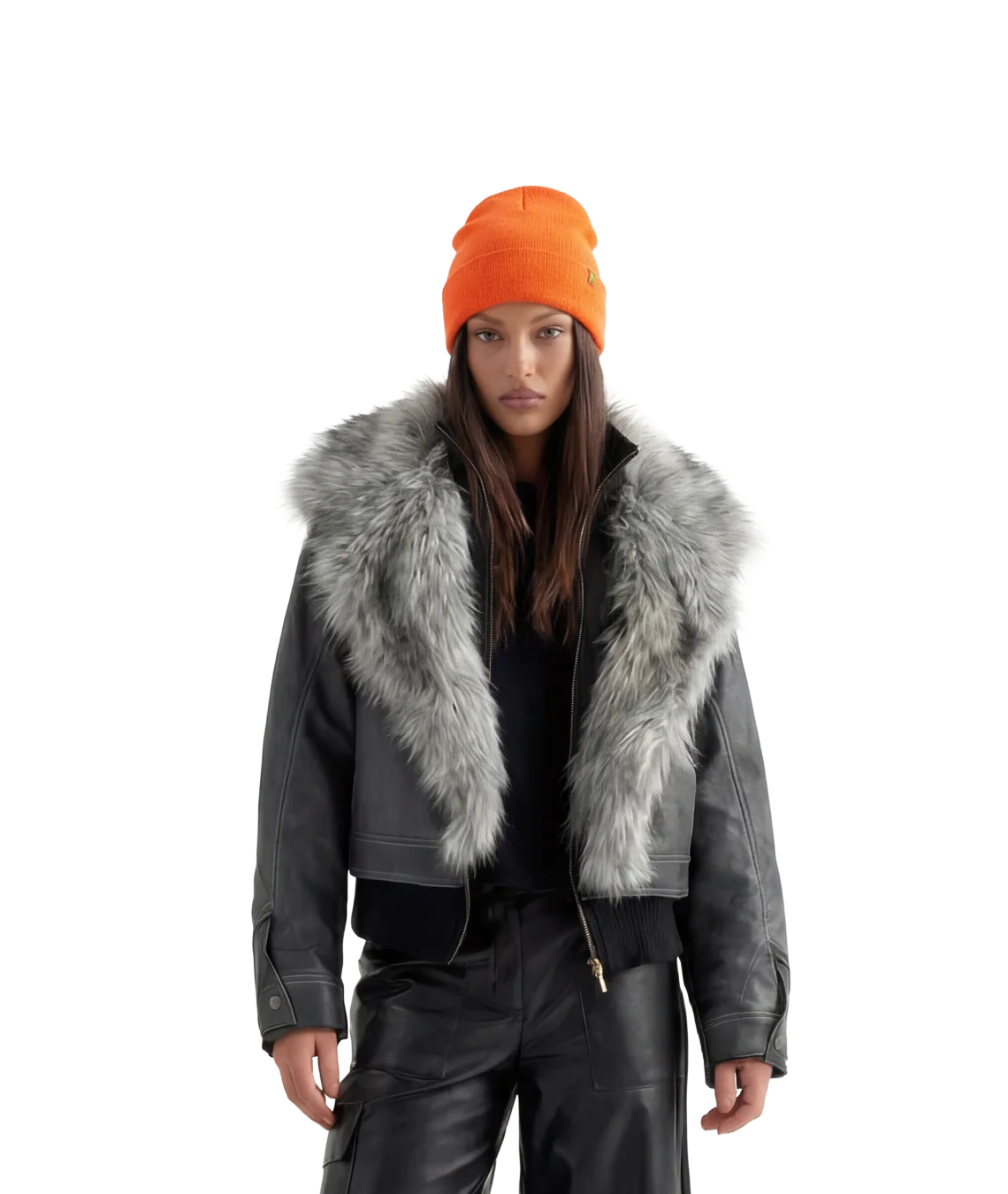 Person wearing a gray coat with fur collar and an orange beanie on a white background