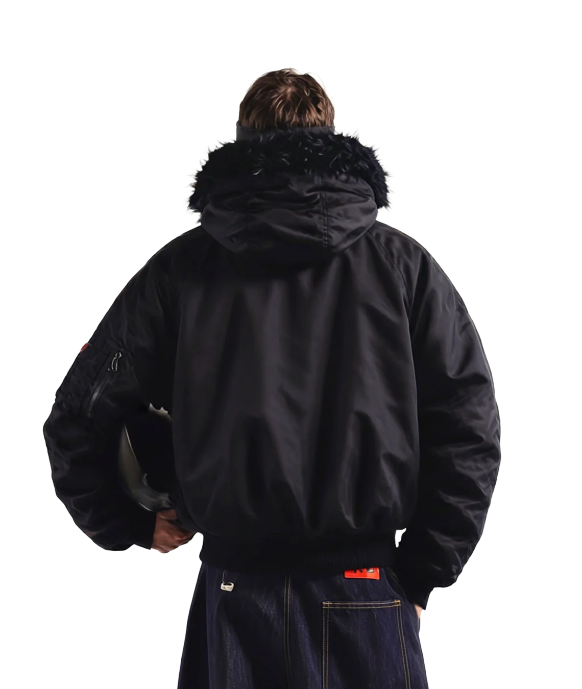 Person wearing a black jacket with fur hood on a white background