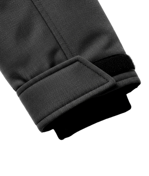Close-up of a black jacket sleeve with a white background