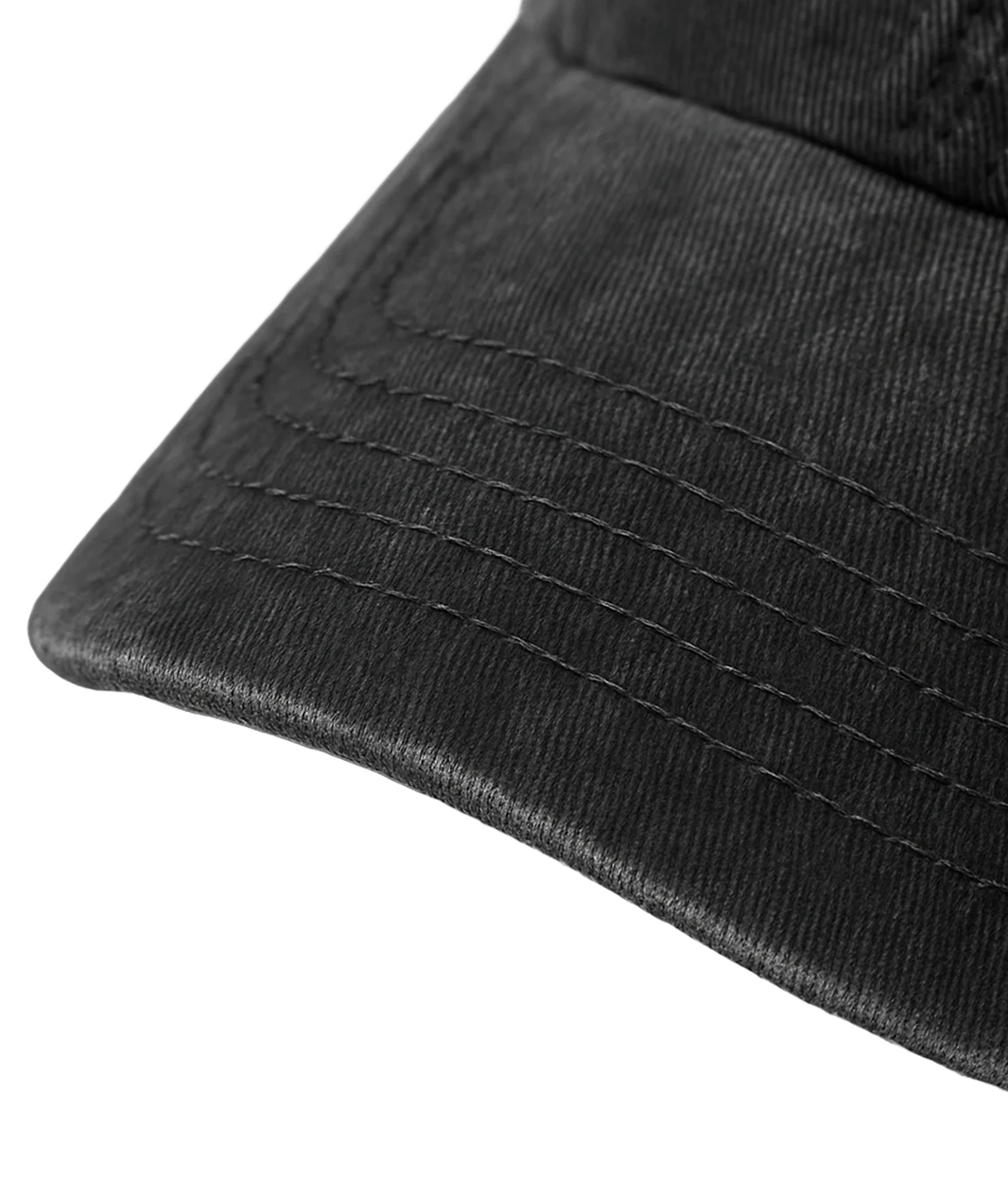 Close-up of a black cap with textured surface on a transparent background