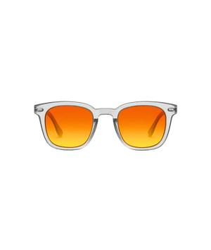 A pair of square sunglasses with a translucent clear frame and vibrant orange-to-yellow gradient lenses, shown against a solid white background.