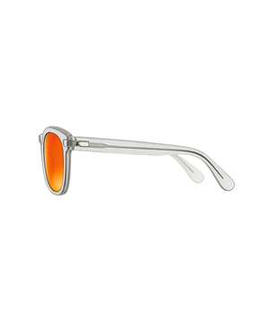 A pair of sunglasses with a clear, transparent frame and vibrant orange mirrored lenses, shown from a side profile view against a solid white background.