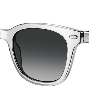 Clear frame sunglasses with dark gradient lenses on a white background