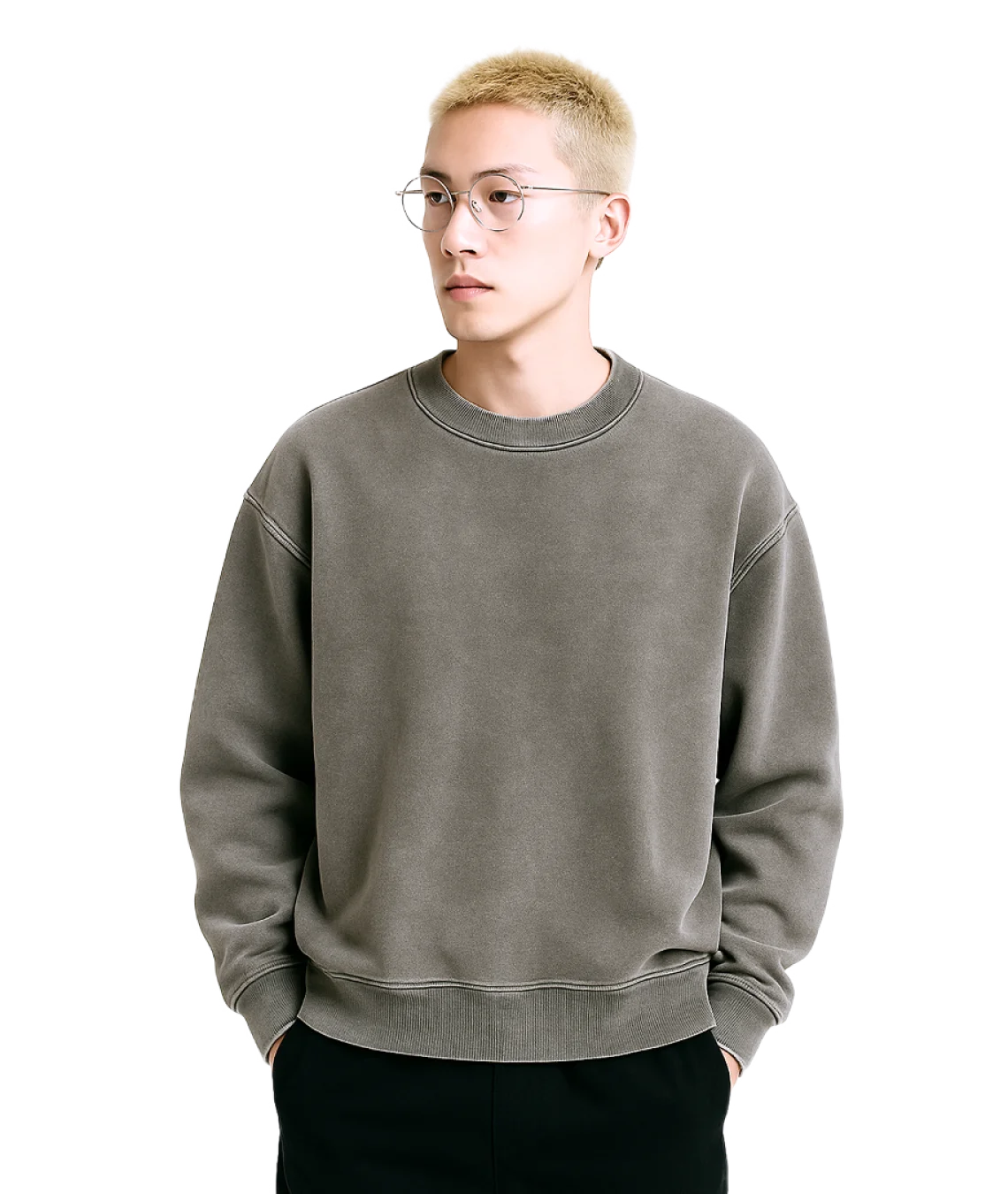Person wearing a gray sweatshirt on a transparent background