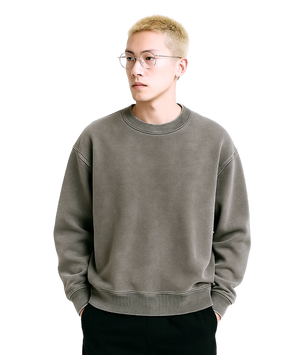 Person wearing a gray sweatshirt on a transparent background