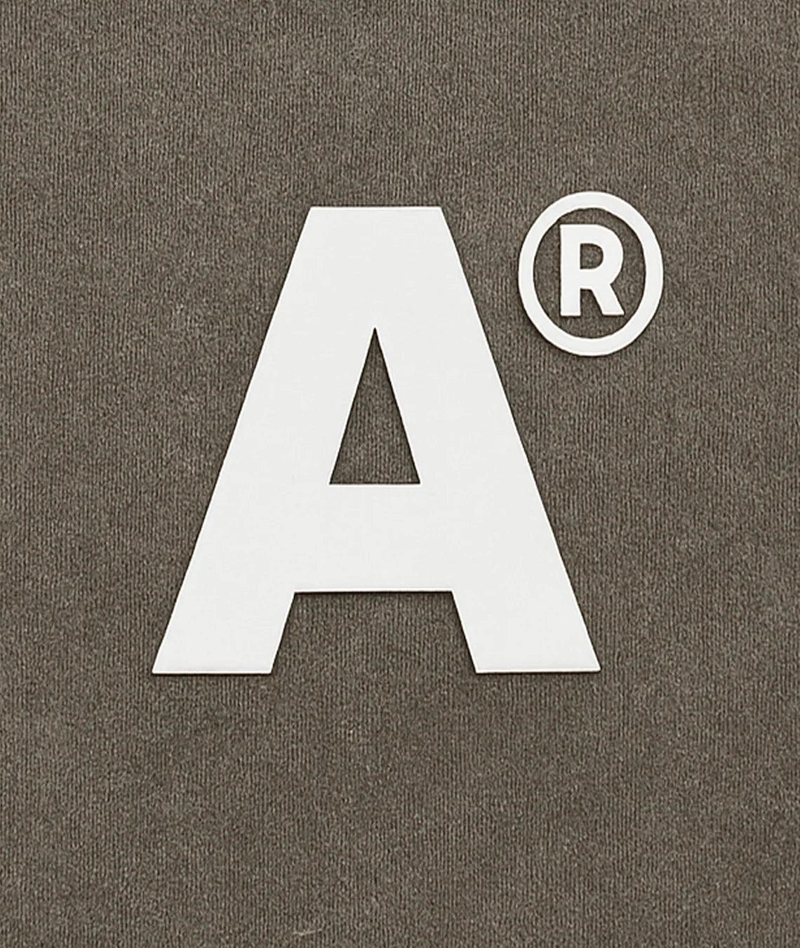 White letter 'A' with a registered trademark symbol on a brown background