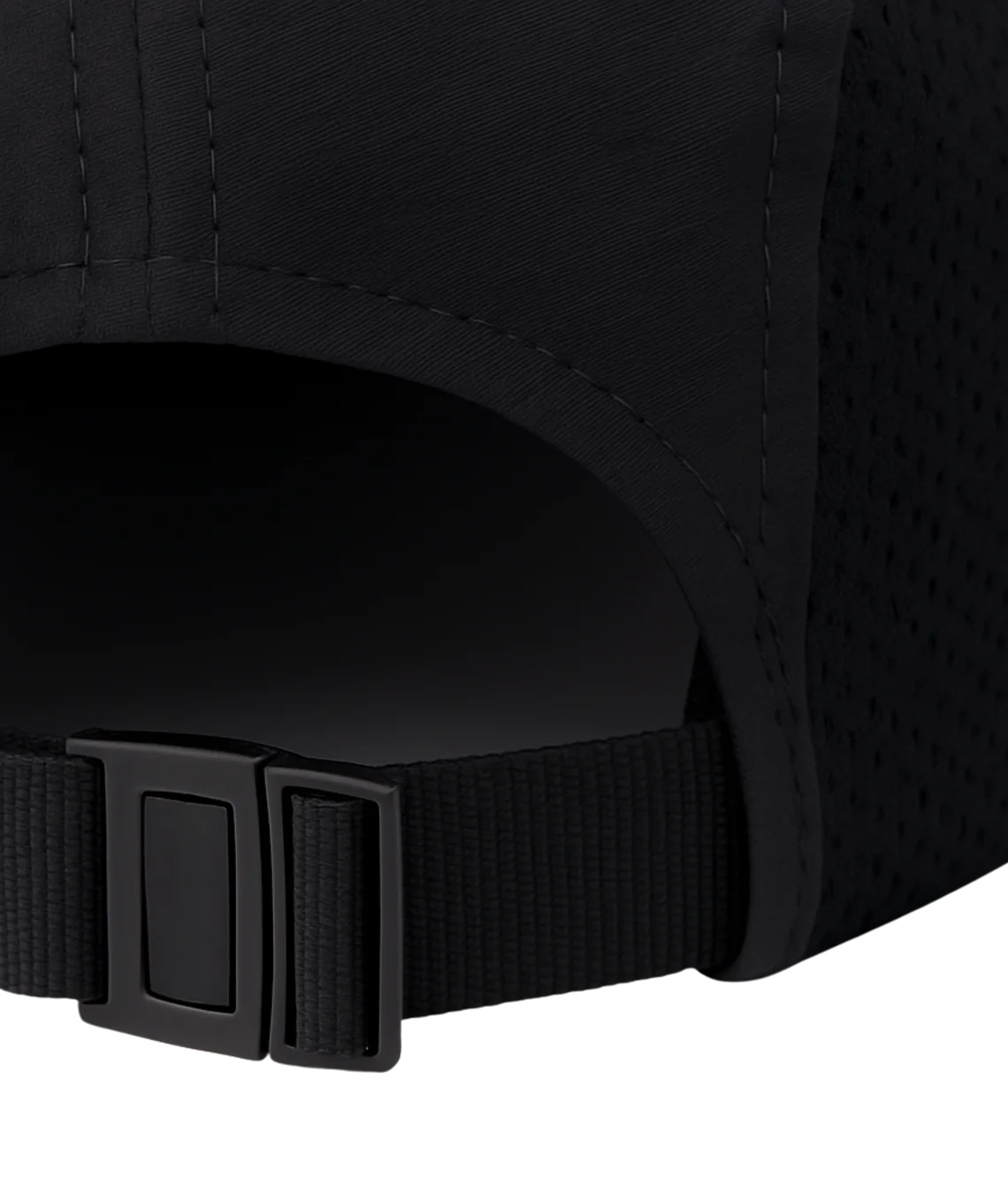 Close-up of a black cap with a buckle on a black background