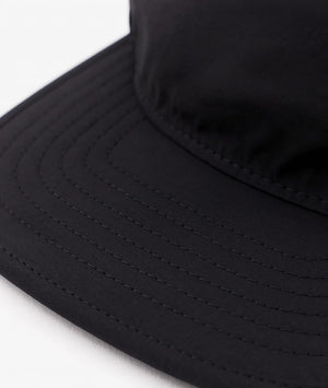 Close-up of a black bucket hat on a white background