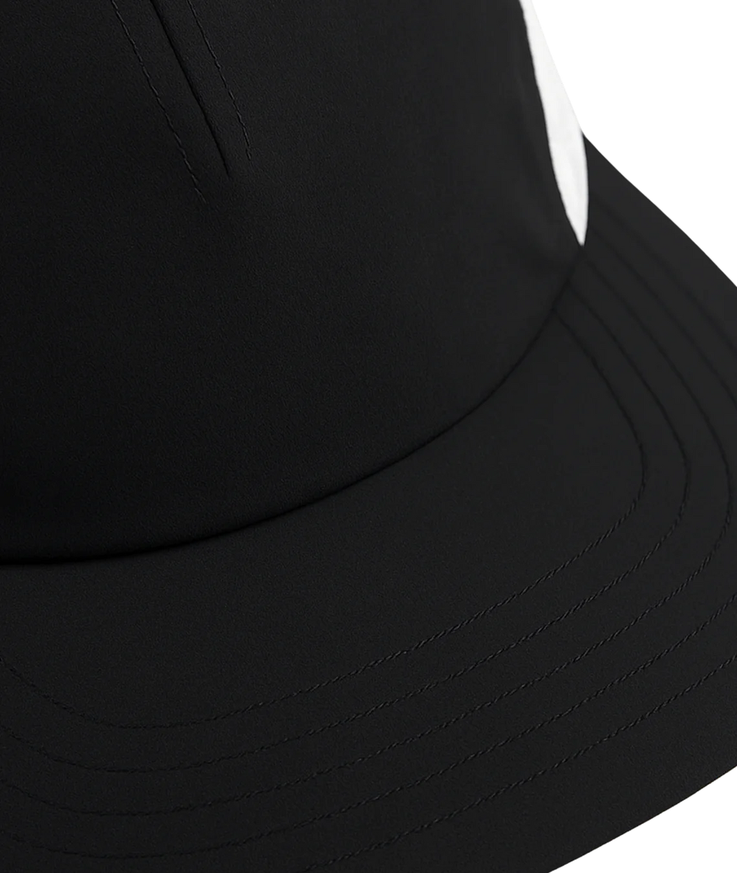 Close-up of a black cap with a white background