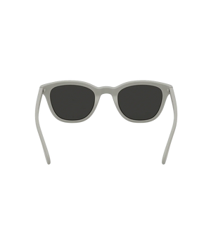 A pair of square sunglasses with a matte light gray frame and dark gray lenses, shown from the front on a solid white background.