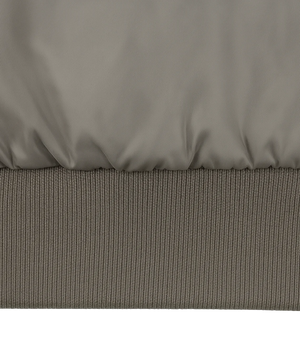 Close-up of a gray quilted fabric surface