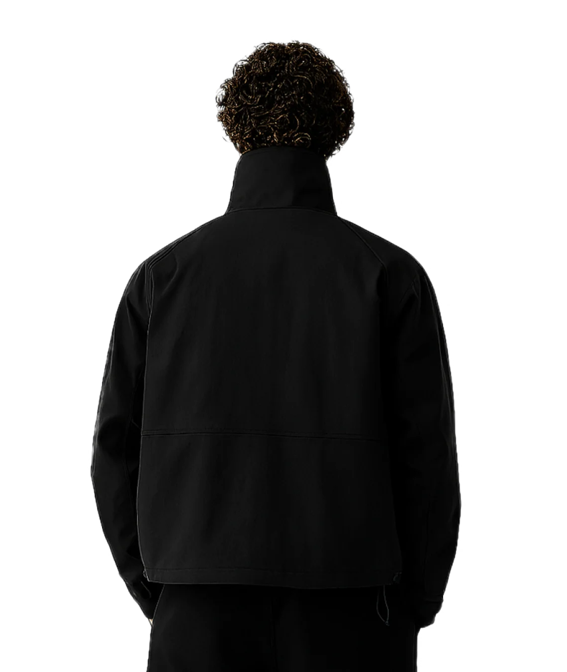 Person wearing a black jacket with white trim on a transparent background
