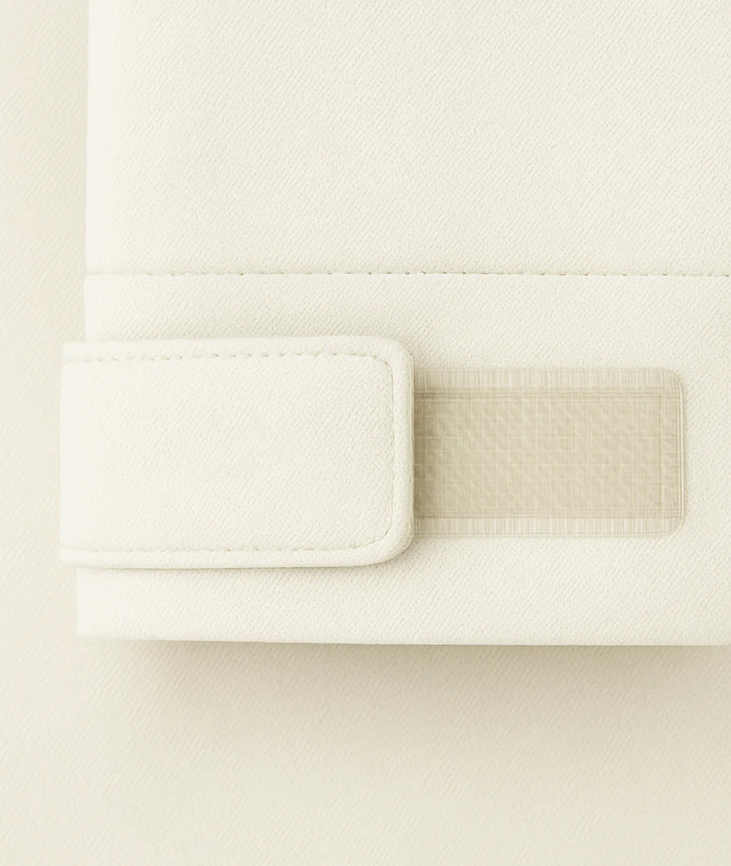 Close-up of a textured white surface with a rectangular cutout