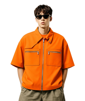 Person wearing an orange short-sleeve jacket with a white background