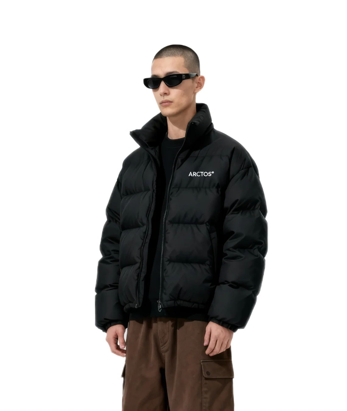 Person wearing a black puffer jacket with 'Arctos' branding on a white background