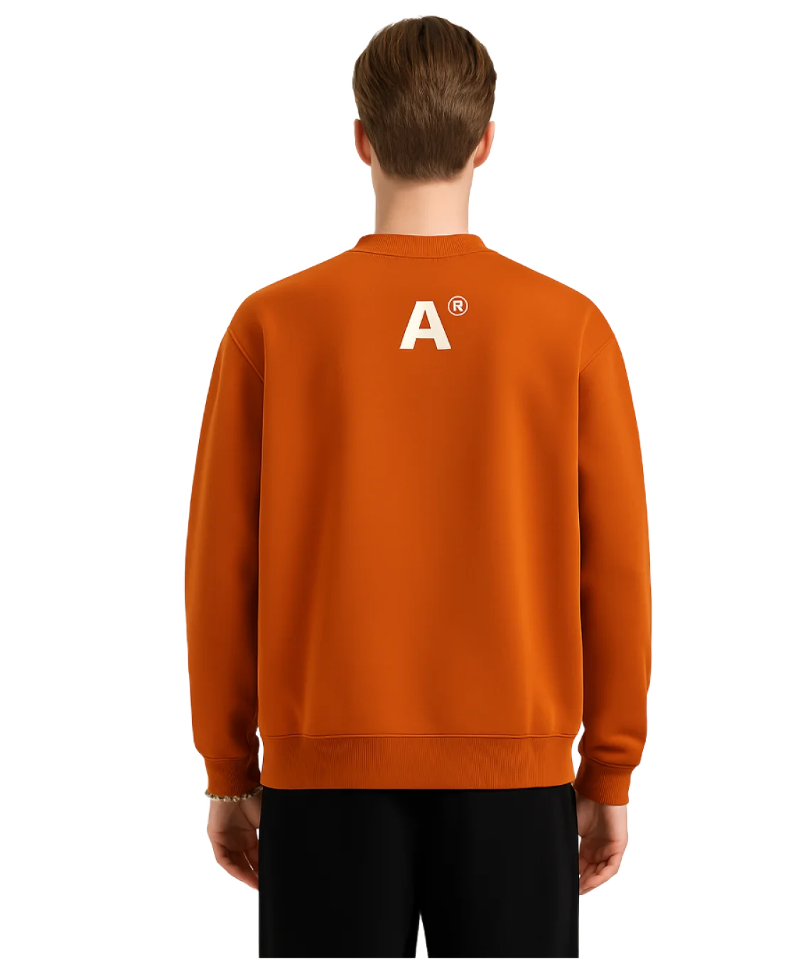 Person wearing an orange sweatshirt with a logo on the back against a white background