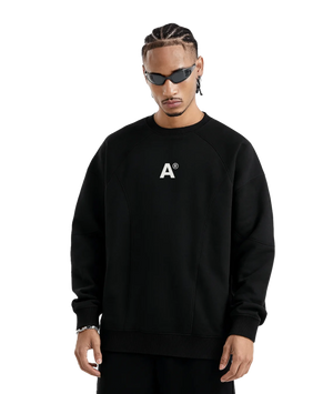 Person wearing a black sweatshirt with a white logo on a transparent background