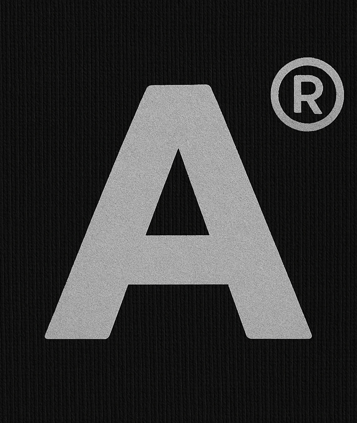 Gray 'A' logo with a registered trademark symbol on a black background