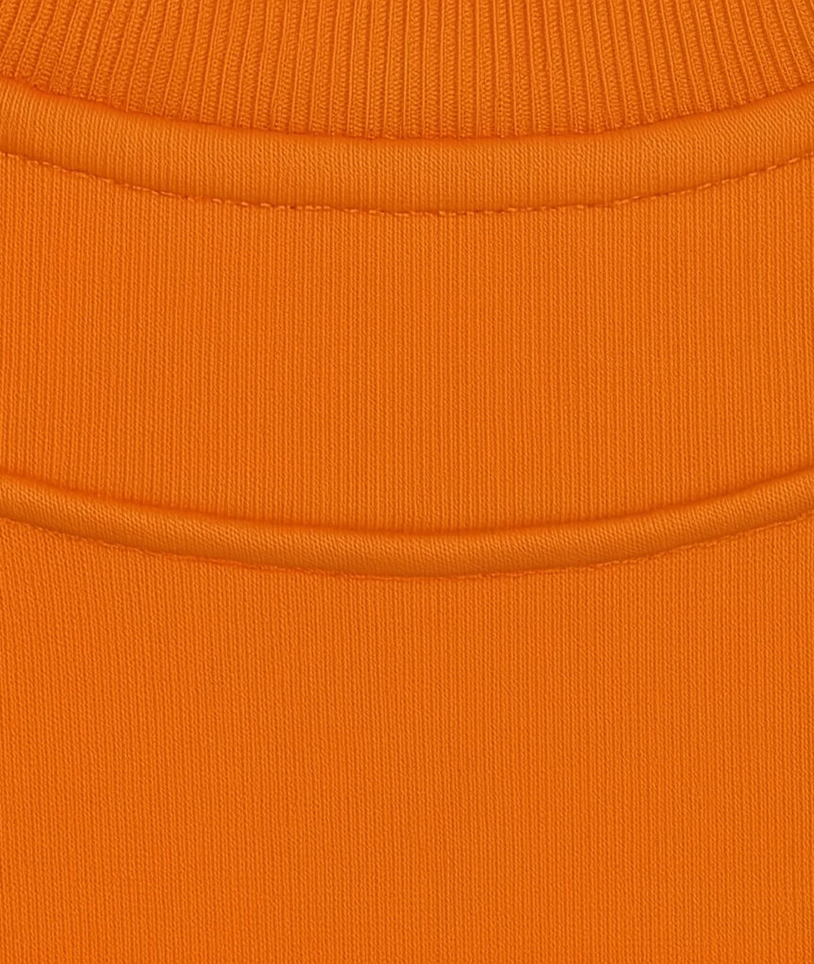 Close-up of an orange fabric texture