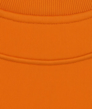 Close-up of an orange fabric texture