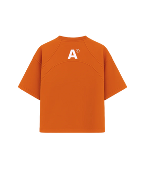 Orange t-shirt with a logo on the back against a white background