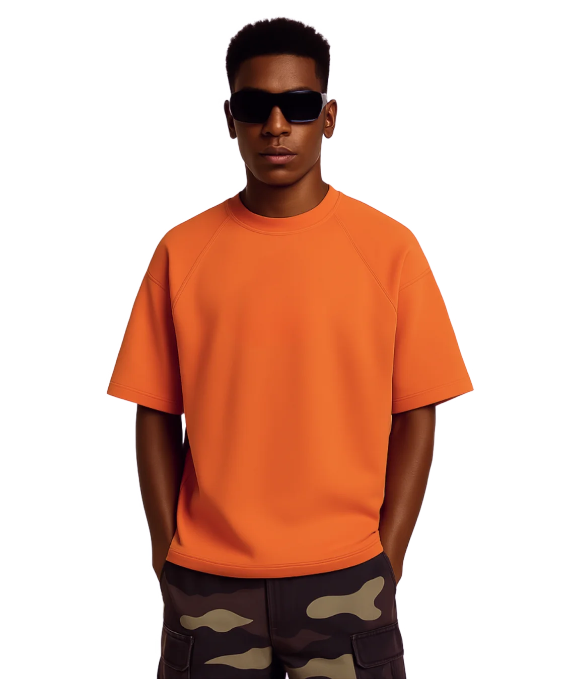 Person wearing an orange t-shirt and camouflage pants on a white background