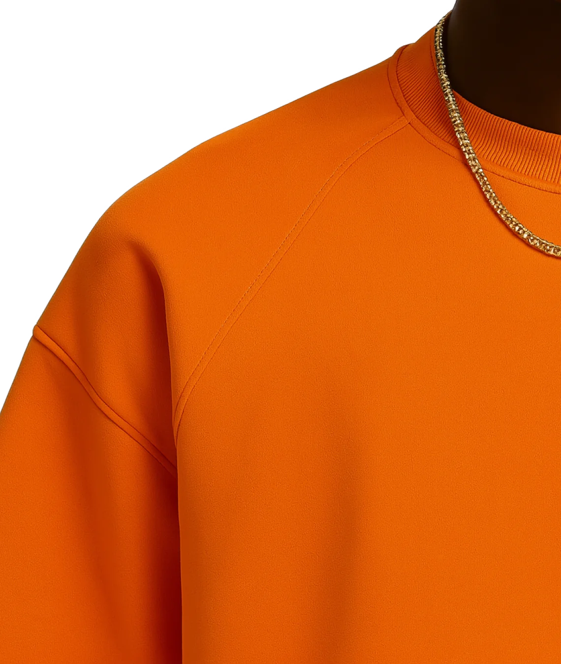 Close-up of an orange sweatshirt with a chain necklace on a white background
