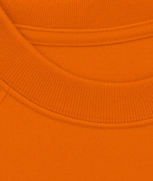Close-up of an orange fabric texture