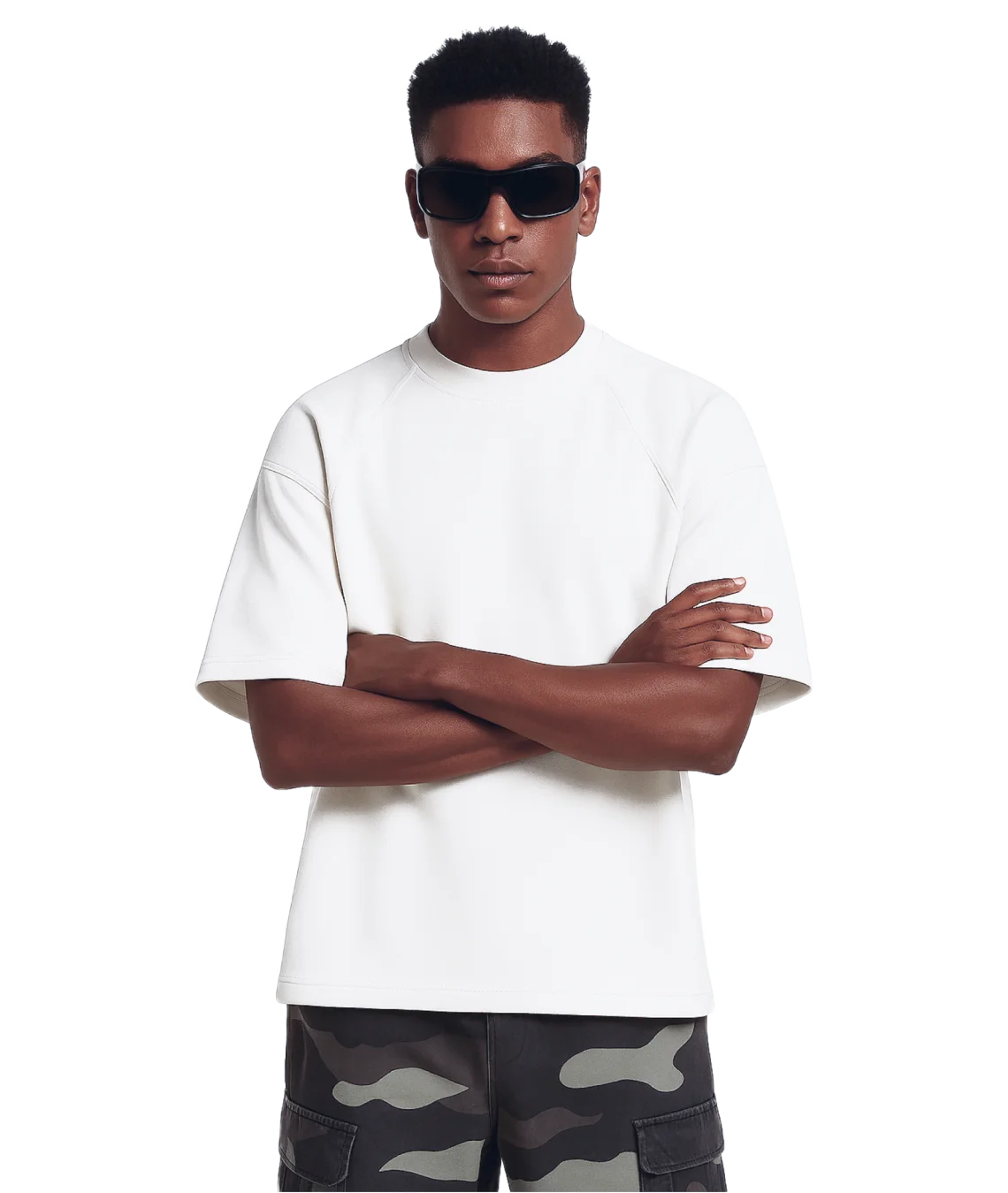 Man wearing a white t-shirt and camouflage pants with sunglasses on a white background