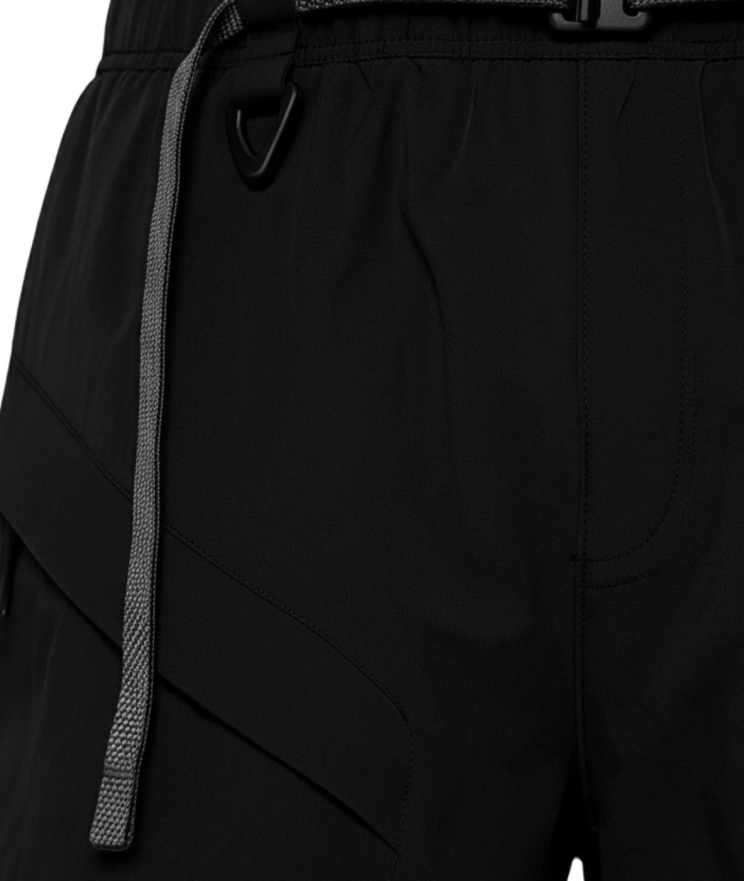 Close-up of black pants with a drawstring and belt buckle.