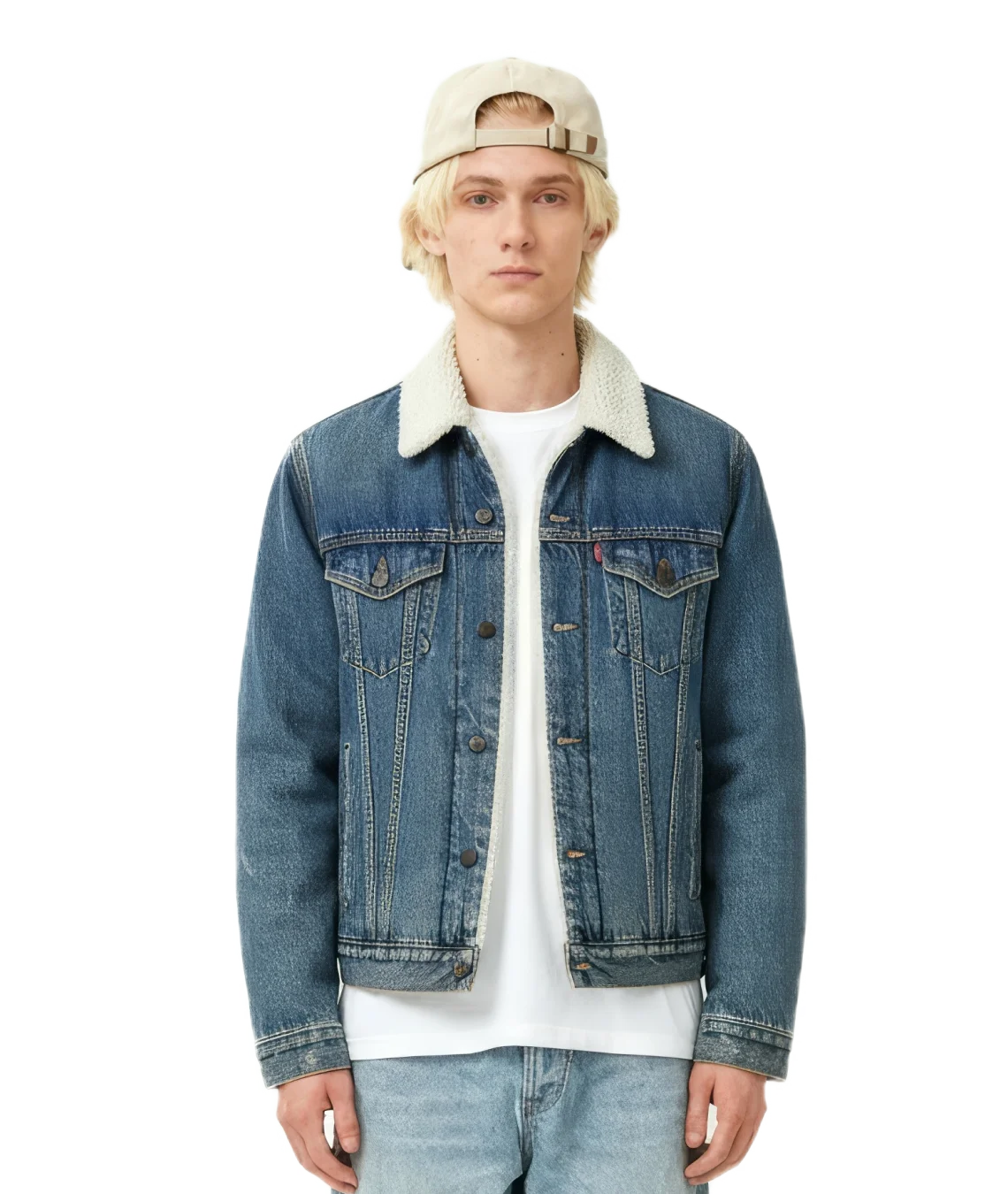 Person wearing a blue denim jacket with a white shirt underneath on a white background