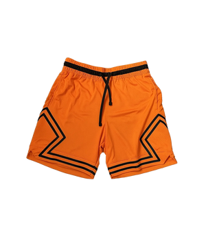 Orange shorts with black geometric patterns on a white background