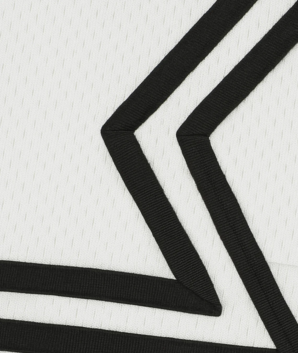 Black ribbons on a textured white background
