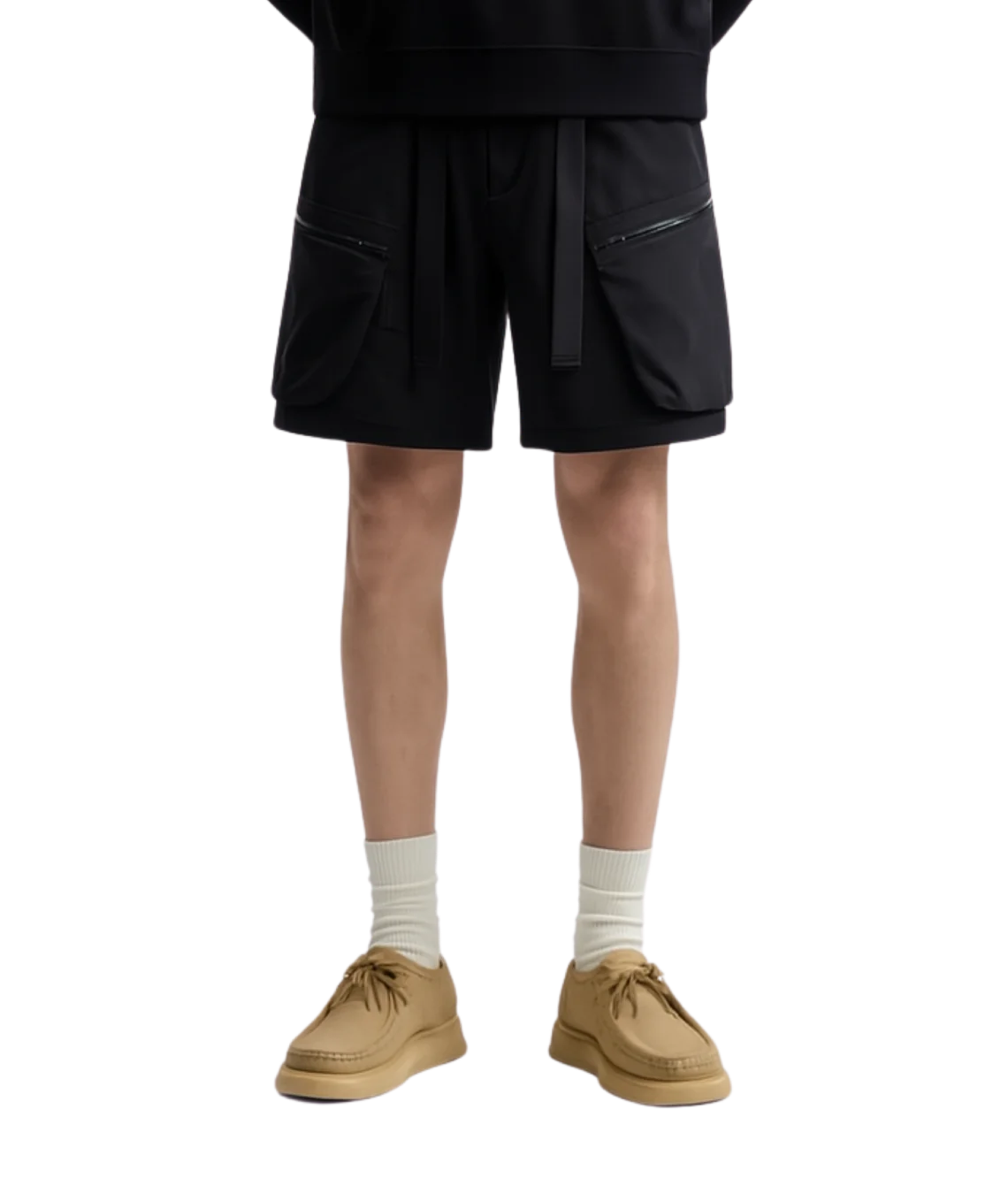 Person wearing a black outfit with beige shoes on a transparent background
