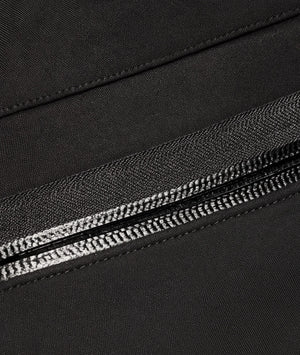 Close-up of a black fabric with a zipper