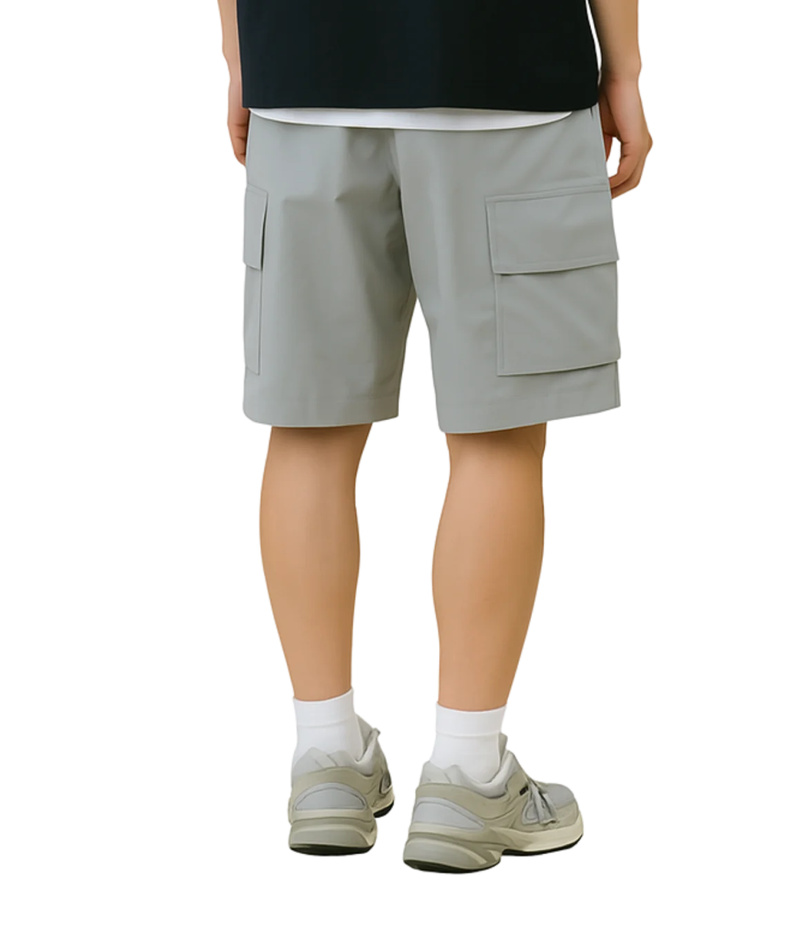 Person wearing light gray cargo shorts on a white background
